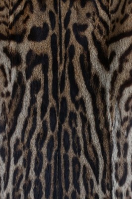 Lot 107 - An ocelot coat with sable collar, late 1960s,...