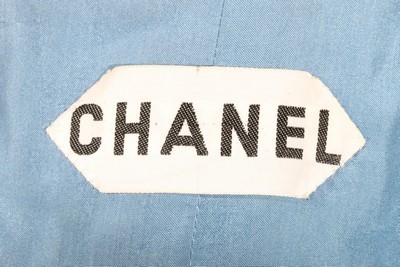Lot 84 - A Chanel couture blue tweed ensemble, circa...