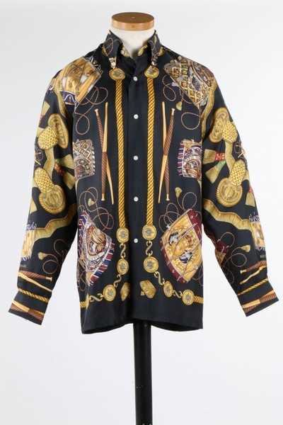 Lot 45 - An Hermès 'Les Tambours' printed silk man's...