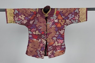 Lot 478 - A brocaded silk jacket made from a Chinese...