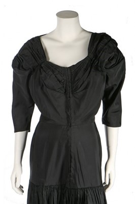 Lot 130 - A Madame Grès couture black faille evening...