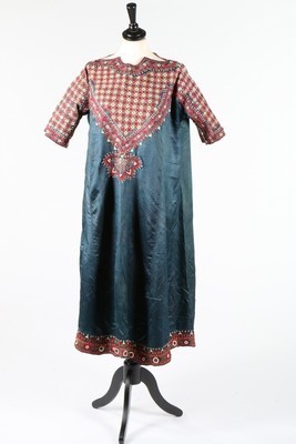 Lot 436 - A finely embroidered blue satin woman's robe,...