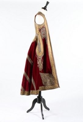 Lot 453 - An embroidered wine velvet surcoat, Ottoman...