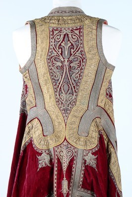 Lot 453 - An embroidered wine velvet surcoat, Ottoman...