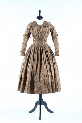 Lot 32 - A printed cotton and muslin day dress, circa...