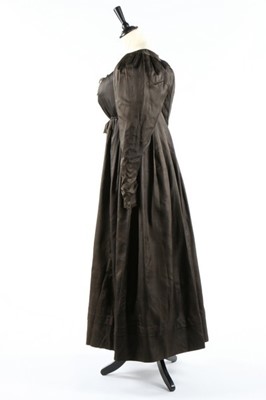 Lot 35 - A chocolate brown silk 'Quaker' dress, circa...
