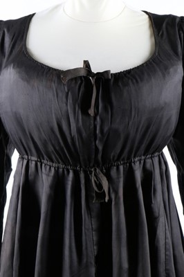 Lot 35 - A chocolate brown silk 'Quaker' dress, circa...