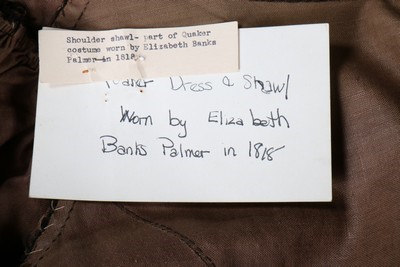 Lot 35 - A chocolate brown silk 'Quaker' dress, circa...