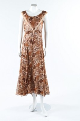 Lot 36 - A printed chiffon evening gown, mid 1930s, the...
