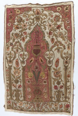 Lot 438 - An embroidered mehrab or prayer arch, Ottoman,...