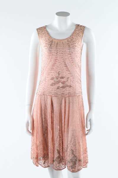Lot 12 - A beaded pink muslin flapper dress, circa 1928,...
