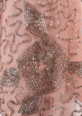 Lot 12 - A beaded pink muslin flapper dress, circa 1928,...