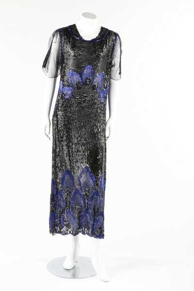 Lot 13 - A sequined tulle flapper dress, early 1920s,...