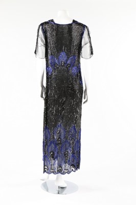 Lot 13 - A sequined tulle flapper dress, early 1920s,...