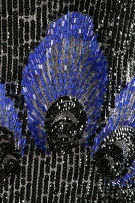Lot 13 - A sequined tulle flapper dress, early 1920s,...