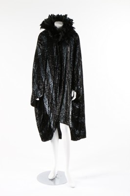 Lot 15 - A dramatic sequined bat-wing opera cape, 1920s,...