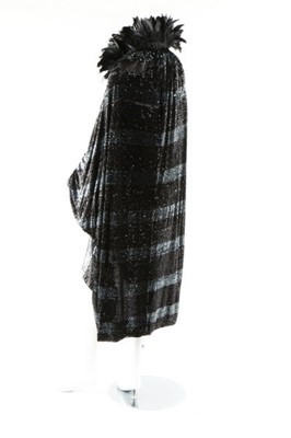 Lot 15 - A dramatic sequined bat-wing opera cape, 1920s,...