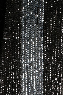 Lot 15 - A dramatic sequined bat-wing opera cape, 1920s,...