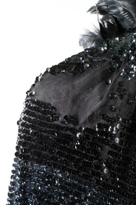 Lot 15 - A dramatic sequined bat-wing opera cape, 1920s,...