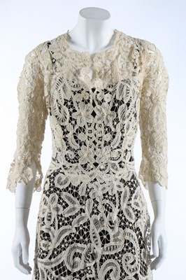 Lot 16 - A gown of Edwardian Battenberg tapelace,...