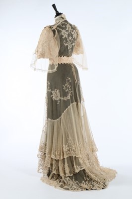 Lot 17 - An embroidered and appliqued lace bridal gown,...