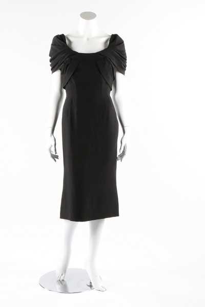 Lot 1 - A Pierre Balmain couture black silk crepe...