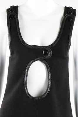 Lot 9 - A Courreges black wool mini-dress or tunic top,...