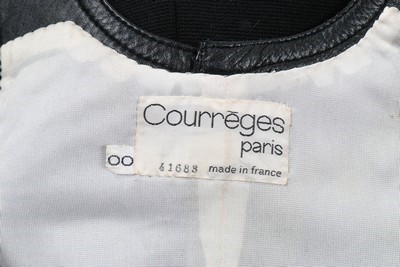 Lot 9 - A Courreges black wool mini-dress or tunic top,...