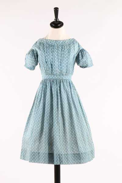 Lot 33 - Three printed cotton girl's dresses, one of...