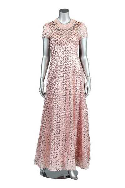 Lot 54 - A colourful group of evening dresses, late 60s-...