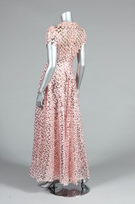 Lot 54 - A colourful group of evening dresses, late 60s-...