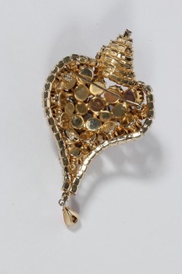 Lot 54 - A Schiaparelli pink conch-shell shaped brooch,...