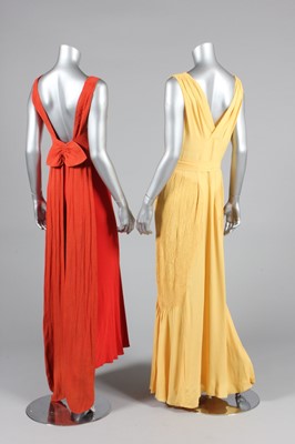 Lot 61 - Two silk crepe bias cut evening gowns, 1930s,...