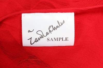 Lot 64 - A Zandra Rhodes printed red chiffon cocktail...