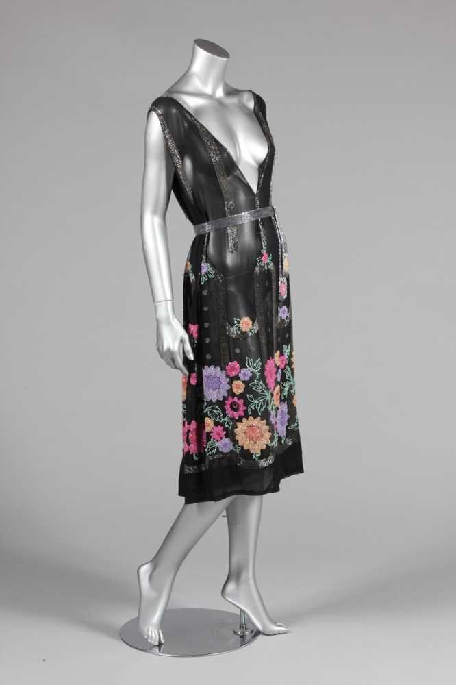 Lot 66 - A beaded flapper dress, mid 1920s, of black...