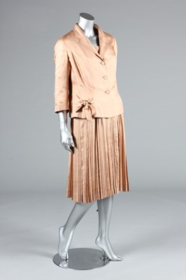 Lot 399 - A Maggy Rouff couture old-rose shantung silk...