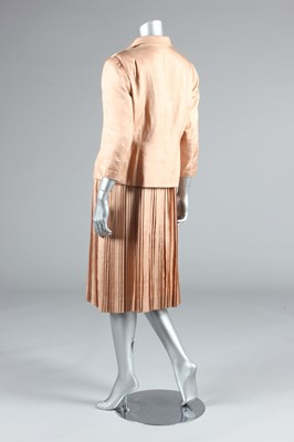 Lot 81 - A Maggy Rouff couture old-rose shantung silk...