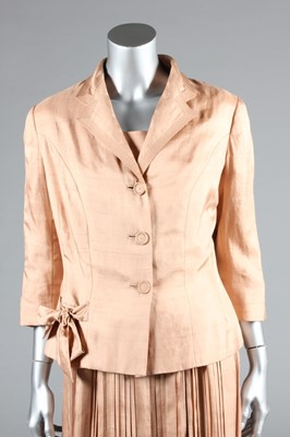Lot 81 - A Maggy Rouff couture old-rose shantung silk...