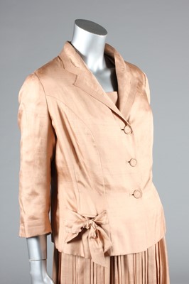 Lot 81 - A Maggy Rouff couture old-rose shantung silk...
