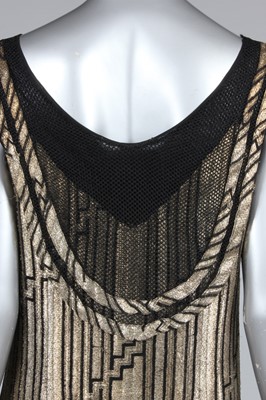 Lot 82 - A gold lamé cocktail dress, late 1920s-early...