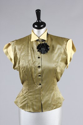 Lot 88 - Three printed cotton cocktail dresses, 1950s,...