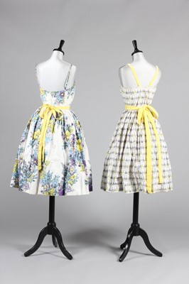 Lot 88 - Three printed cotton cocktail dresses, 1950s,...