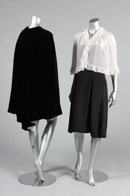 Lot 113 - An embroidered black satin flapper dress,...