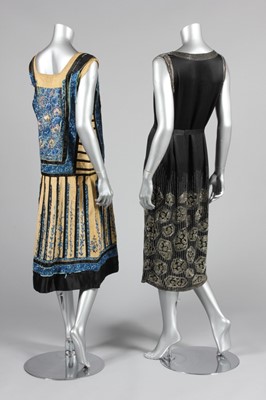 Lot 113 - An embroidered black satin flapper dress,...