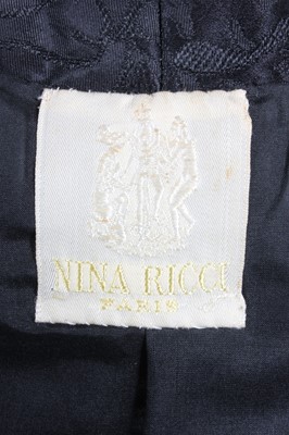 Lot 137 - A Nina Ricci couture black brocatelle dinner...