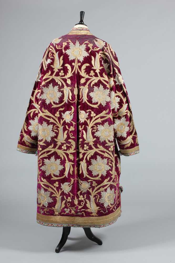 Lot 311 - A fine and important embroidered purple velvet...