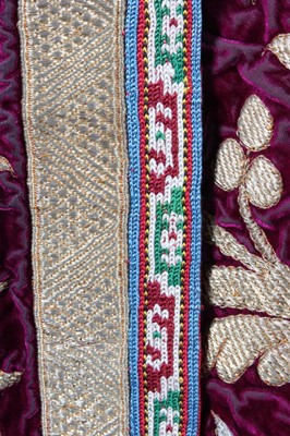 Lot 311 - A fine and important embroidered purple velvet...