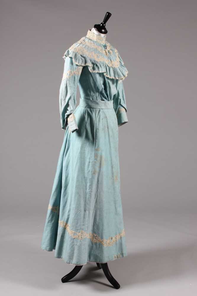 Lot 3 - A blue figured cotton summer gown, circa 1900,...