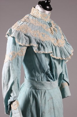 Lot 3 - A blue figured cotton summer gown, circa 1900,...