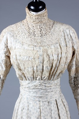 Lot 3 - A blue figured cotton summer gown, circa 1900,...